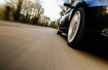 close up of car wheels on the road